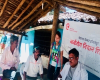 Dr. Pawan Argade & Paunamyile Ngame with camp attendees.