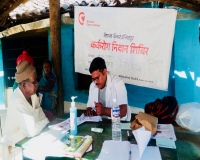 Dr. Pawan Argade consulting the camp attendee.