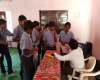 Dr. Pankaj Dwivedi screening the camp attendees