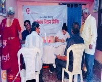 Dr. Pawan Argade & Nurse Anjali Kudawale Consulting the camp attendees.